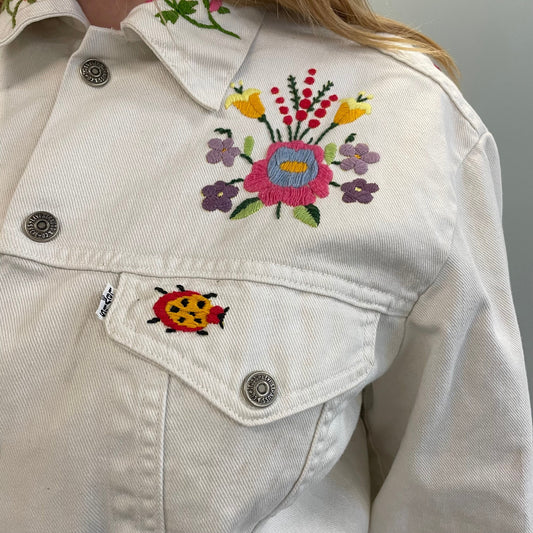vtg levi's FLORAL EMBROIDERED white jean jacket ꕤ ꕤ flowers and bugs nudie suit sweetheart rodeo country rock western ranch wear parsons