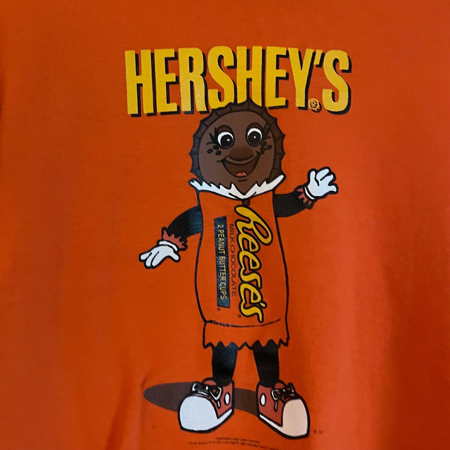 vtg 90s REESES PEANUT BUTTER Cups anthropomorphic candy orange & yellow happy face smiley guy baby tee youth large crop top funny Halloween