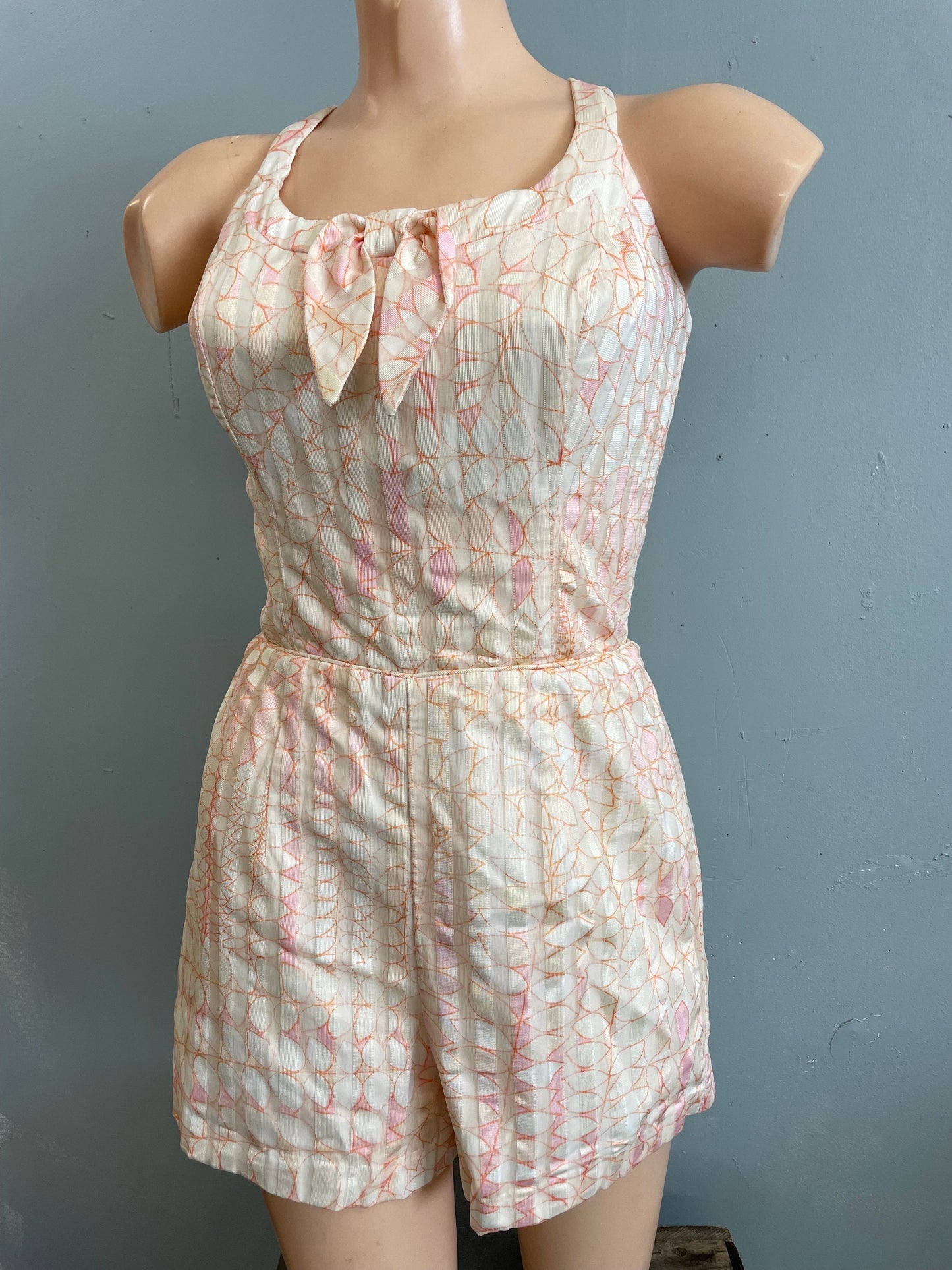 Vtg 1940s Playsuit Tiki of Beverly Hills abstract print criss cross swimsuit bathing suit beach romper pink & pearl iridescent pin up monroe