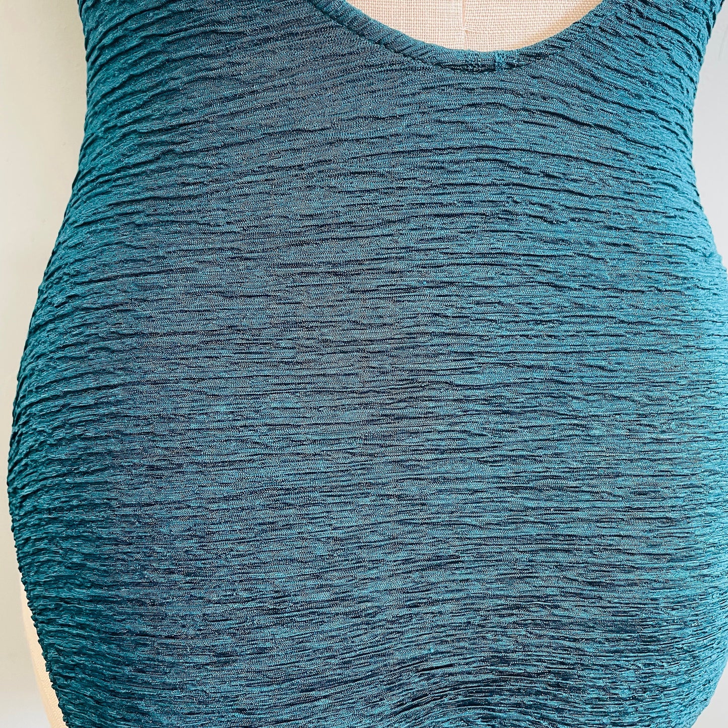 vtg 1970s emerald green crinkly criss cross cut out swimsuit low cut plinge one piece bathing suit 70s disco bodysuit sexy beachwear