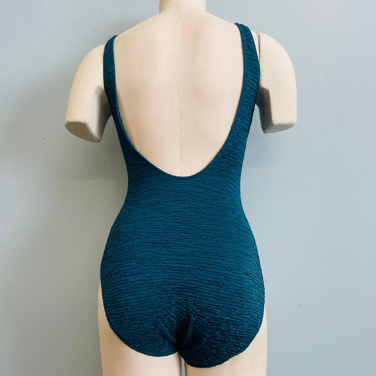 vtg 1970s emerald green crinkly criss cross cut out swimsuit low cut plinge one piece bathing suit 70s disco bodysuit sexy beachwear