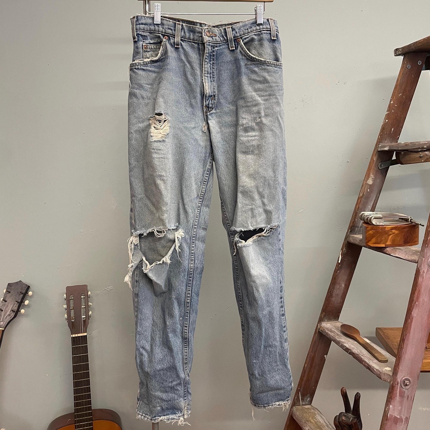 vtg 90s DISTRESSED LEVIS 550 JEANS 32 x 32 // vintage light wash shredded high waisted punk grunge winona ryder ripped faded denim torn worn