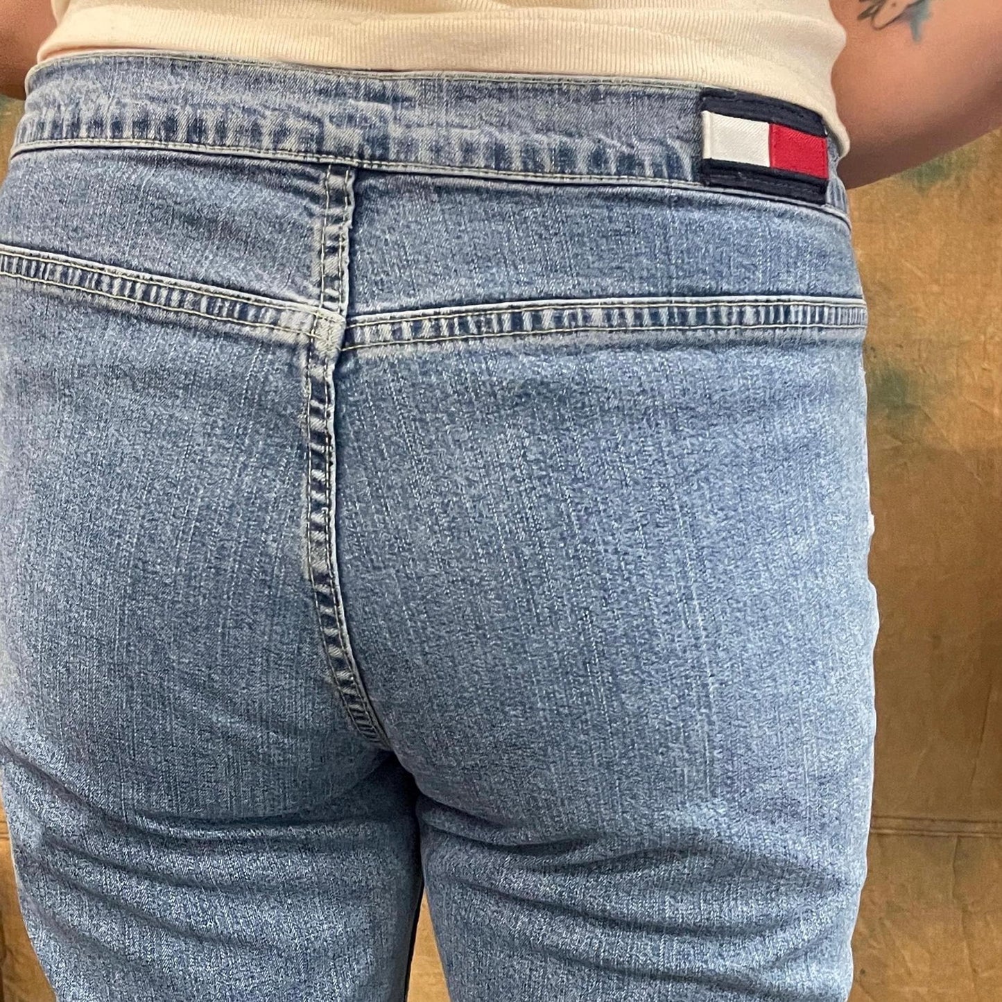 vtg 90s TOMMY HILFIGER JEANS // vintage flare leg bare back low mid rise light wash bell bottom wide leg retro y2k fashion 90s tommy girl